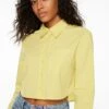 Dynamite Cropped Poplin Button Up Shirt In Endive Yellow