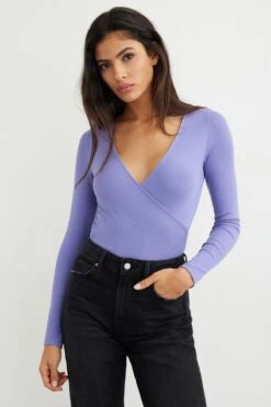 Dynamite Long Sleeve Wrap Bodysuit In Lavender Violet
