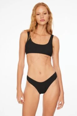 Dynamite Smocked Boomerang Bikini Bottom In Jet Black