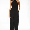 Dynamite Halter Asymmetric Jumpsuit In Jet Black