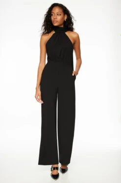 Dynamite Halter Asymmetric Jumpsuit In Jet Black
