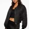 Dynamite Cropped Satin Bomber Jacket In Jet Black