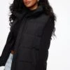 Dynamite Quilted Long Puffer Vest In Jet Black