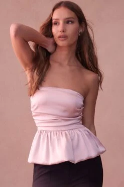 Dynamite Ruched Peplum Satin Top In Lotus Pink