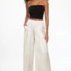 Dynamite Pleated Wide Leg Satin Pants In Polished Pearl Off-White